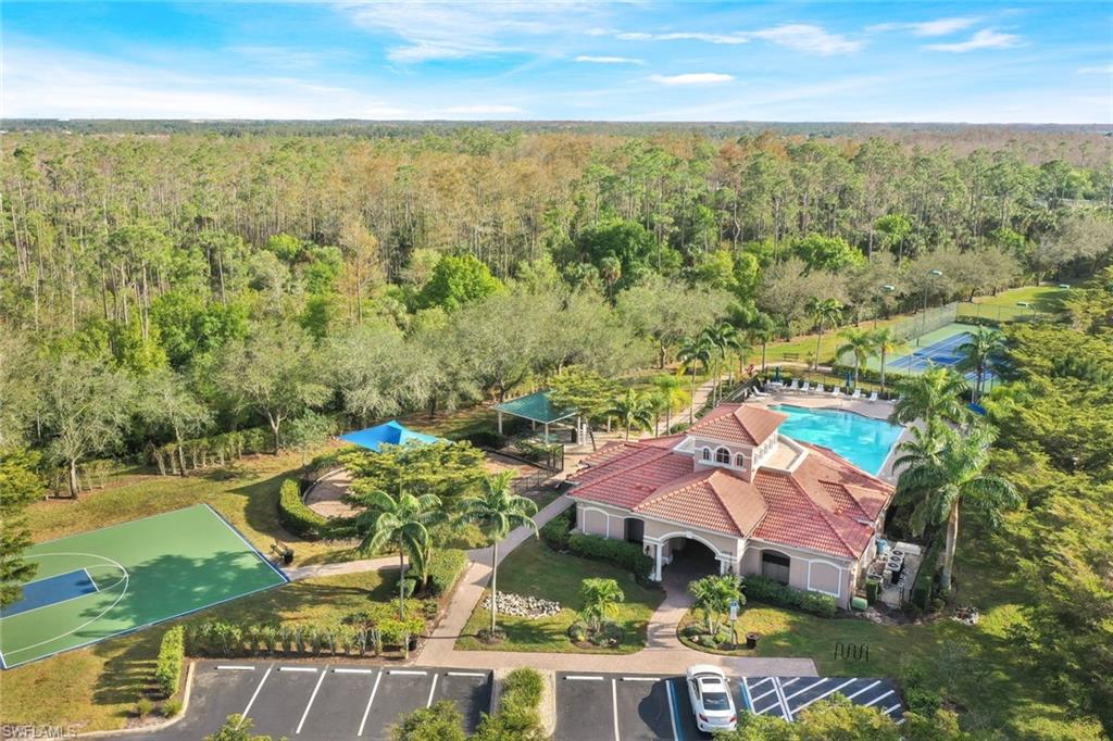 10004 Ravello Boulevard Fort Myers, FL 33905 - Photo 42 of 42 an aerial view of residential houses with outdoor space and trees