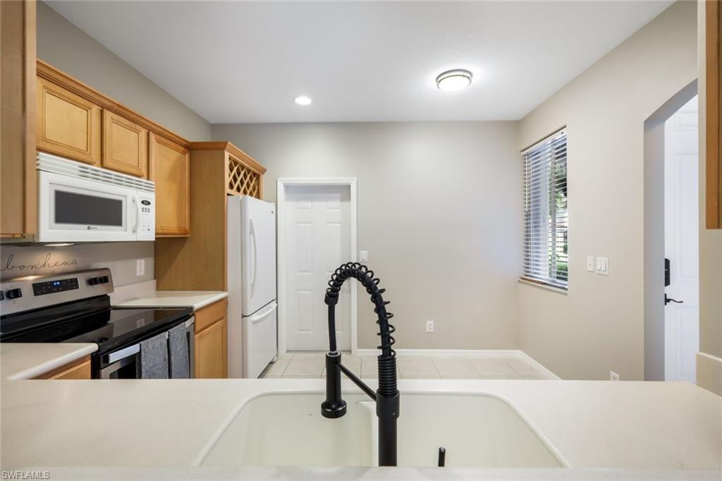 10004 Ravello Boulevard Fort Myers, FL 33905 - Photo 9 of 42 a bathroom with a bathtub and a sink
