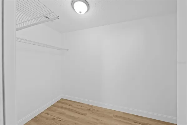 a view of a patio with a yard