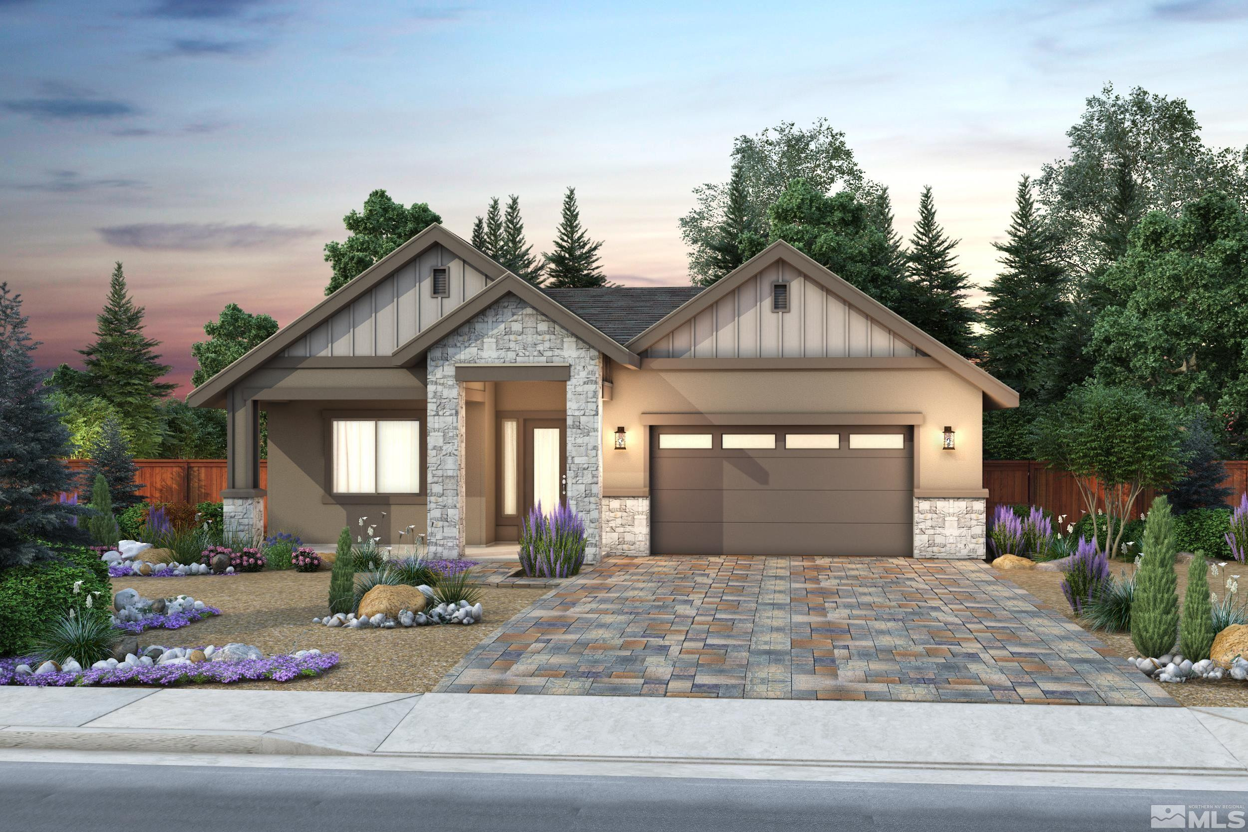 a front view of a house with garage and plants