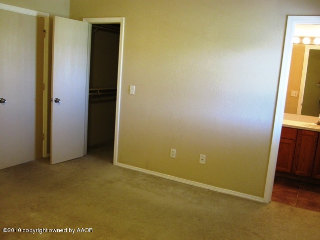 1140 Shasta Drive Amarillo, TX 79110 - Photo 14 of 23 an empty room with windows