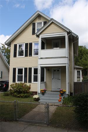 676 Sumner Avenue Springfield, MA 01108 - Photo 15 of 15 a front view of a house with a yard