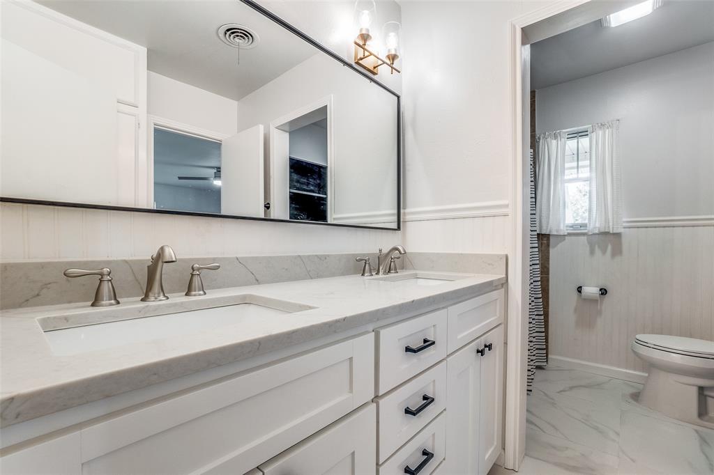 2314 Springhill Drive Dallas, TX 75228 - Photo 22 of 27 Secondary bathroom accessible via the hallway