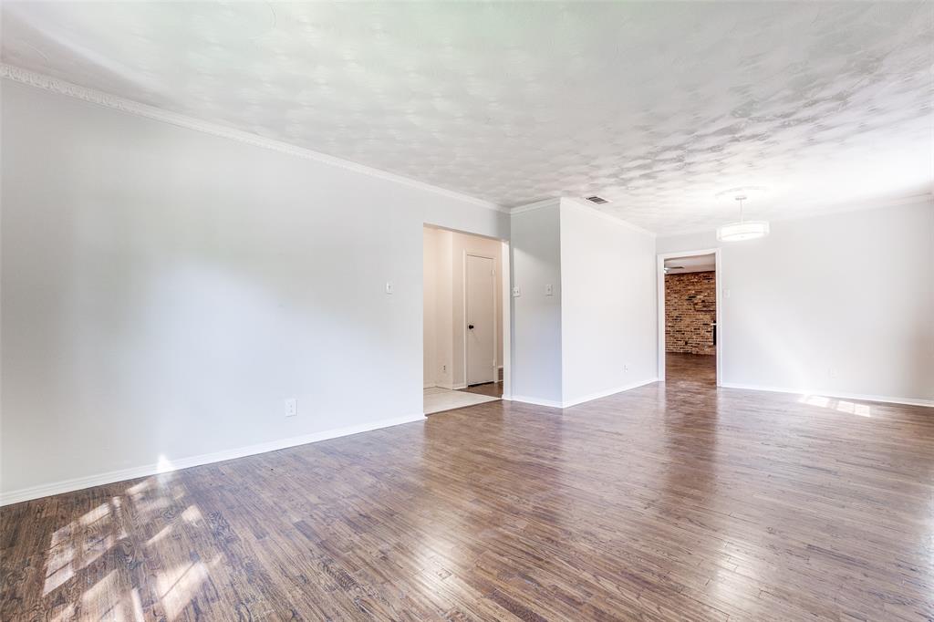2314 Springhill Drive Dallas, TX 75228 - Photo 5 of 27 Formal living/bonus room at front of house for welcoming guests