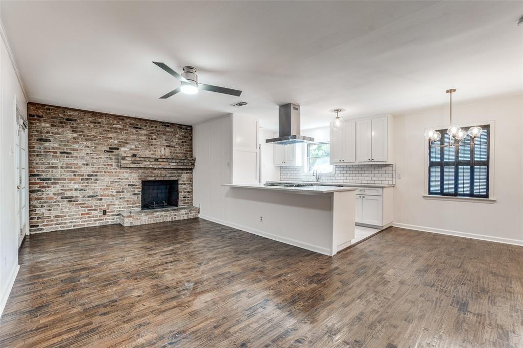 2314 Springhill Drive Dallas, TX 75228 - Photo 8 of 27 Open-concept den-kitchen areas in back of house for added privacy