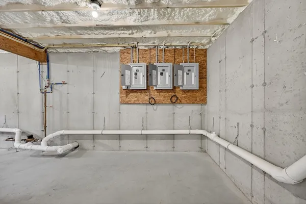 a bathroom with a shower and a sink