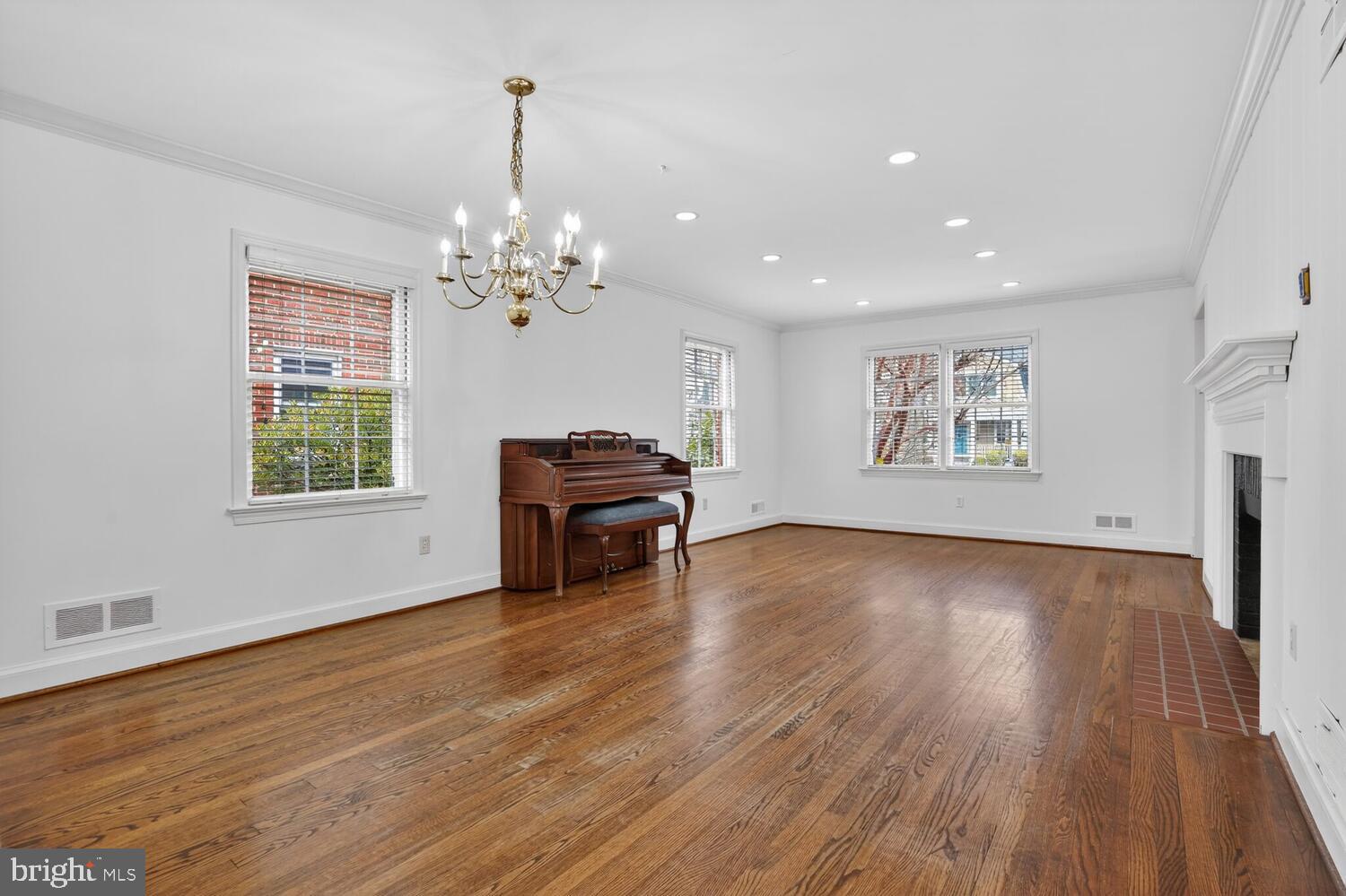 2420 Cameron Mills Road Alexandria, VA 22302 - Photo 13 of 45 a living room with furniture and a wooden floor