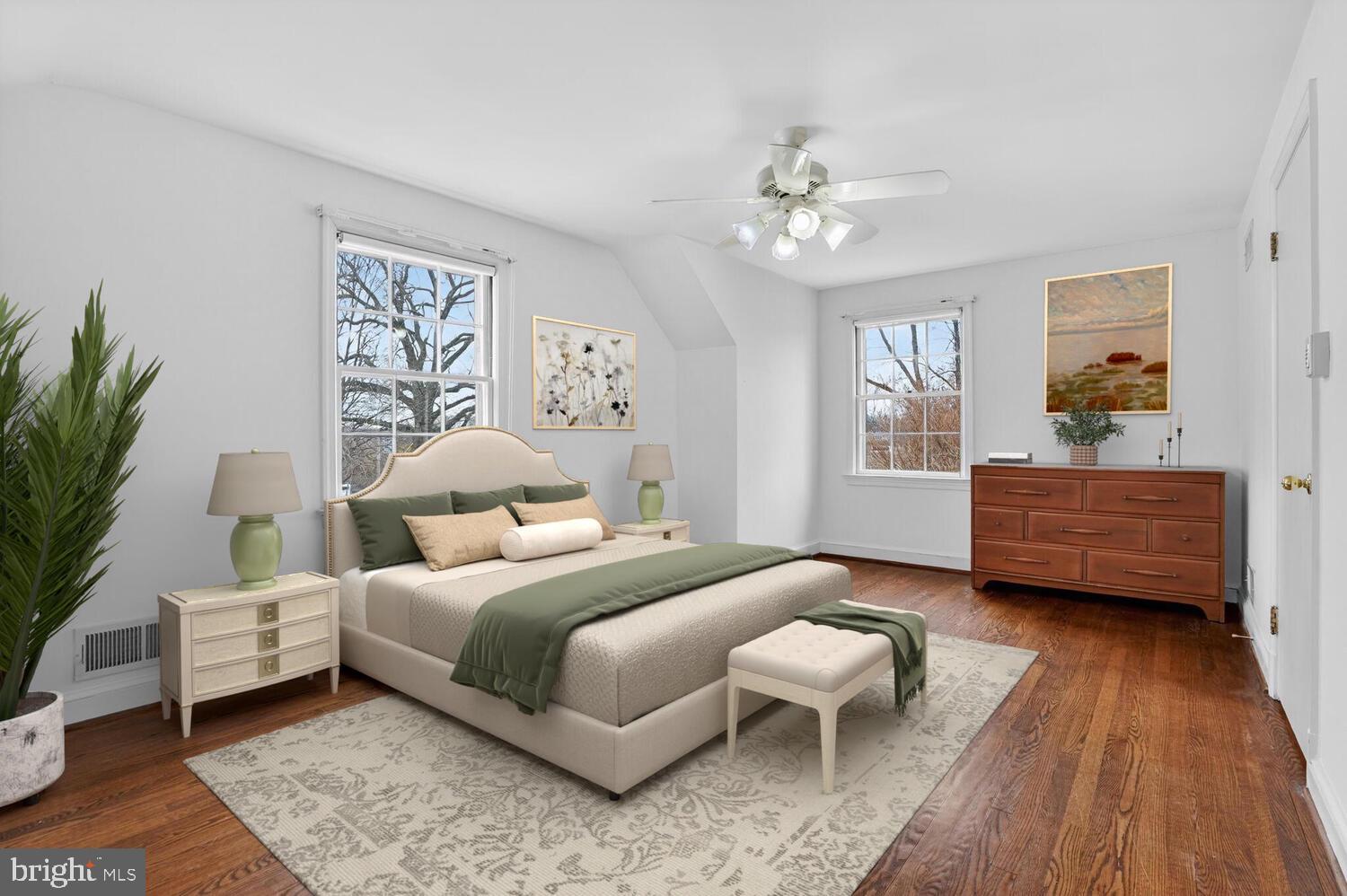 2420 Cameron Mills Road Alexandria, VA 22302 - Photo 27 of 45 a bedroom with a bed and a couch