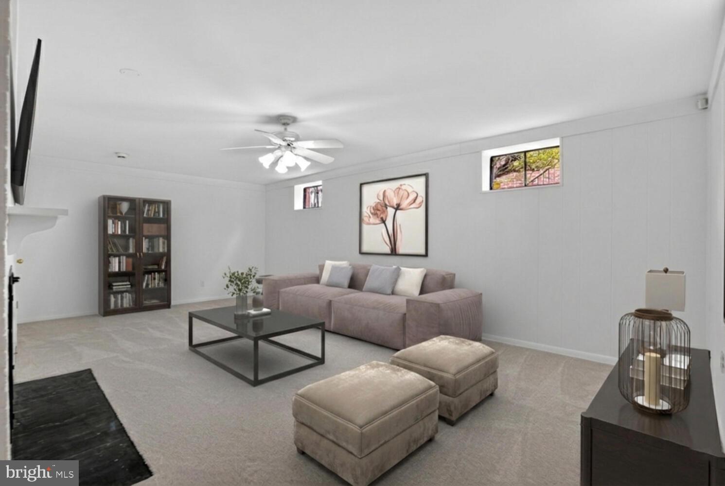 2420 Cameron Mills Road Alexandria, VA 22302 - Photo 33 of 45 a living room with furniture and a chandelier