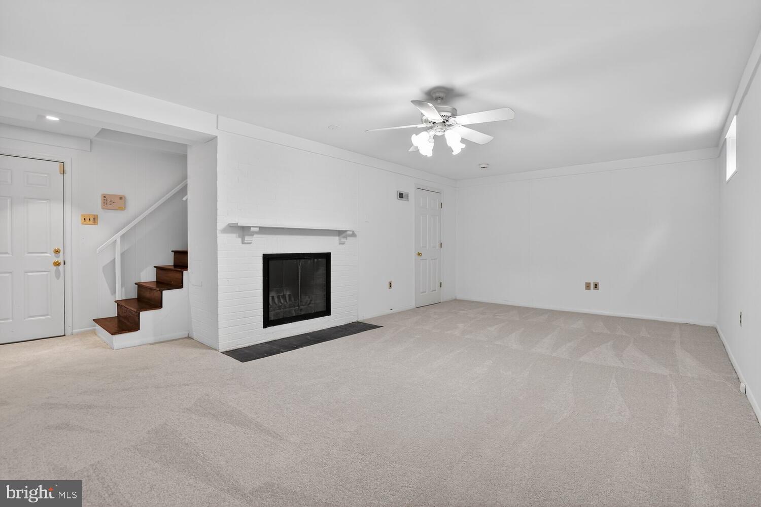 2420 Cameron Mills Road Alexandria, VA 22302 - Photo 36 of 45 a view of empty room with fireplace