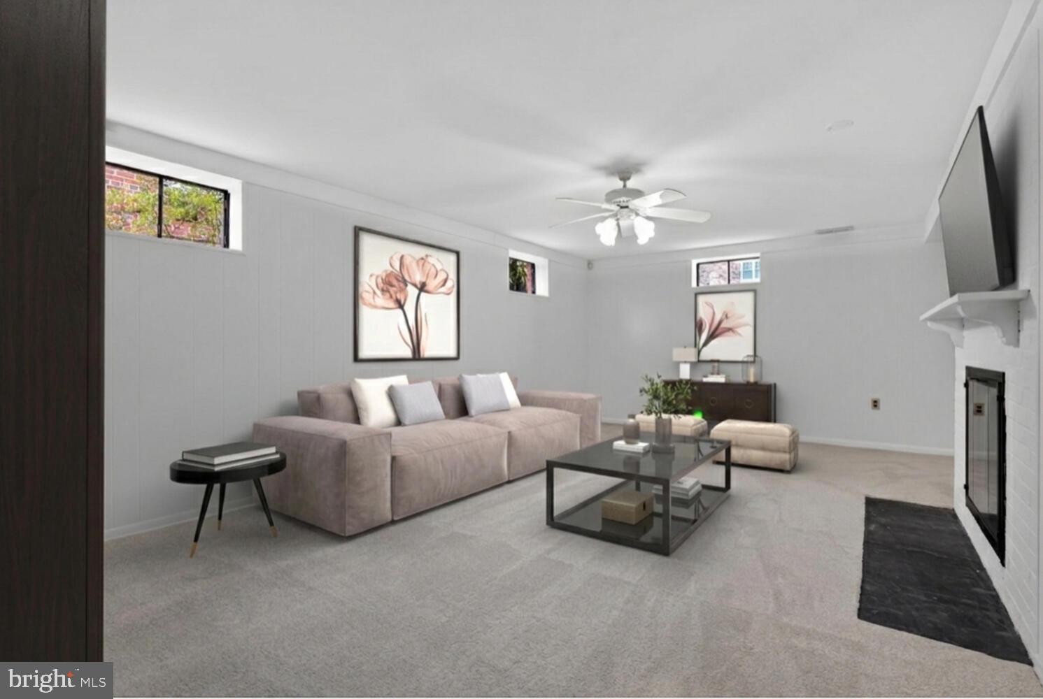 2420 Cameron Mills Road Alexandria, VA 22302 - Photo 37 of 45 a living room with furniture and a flat screen tv