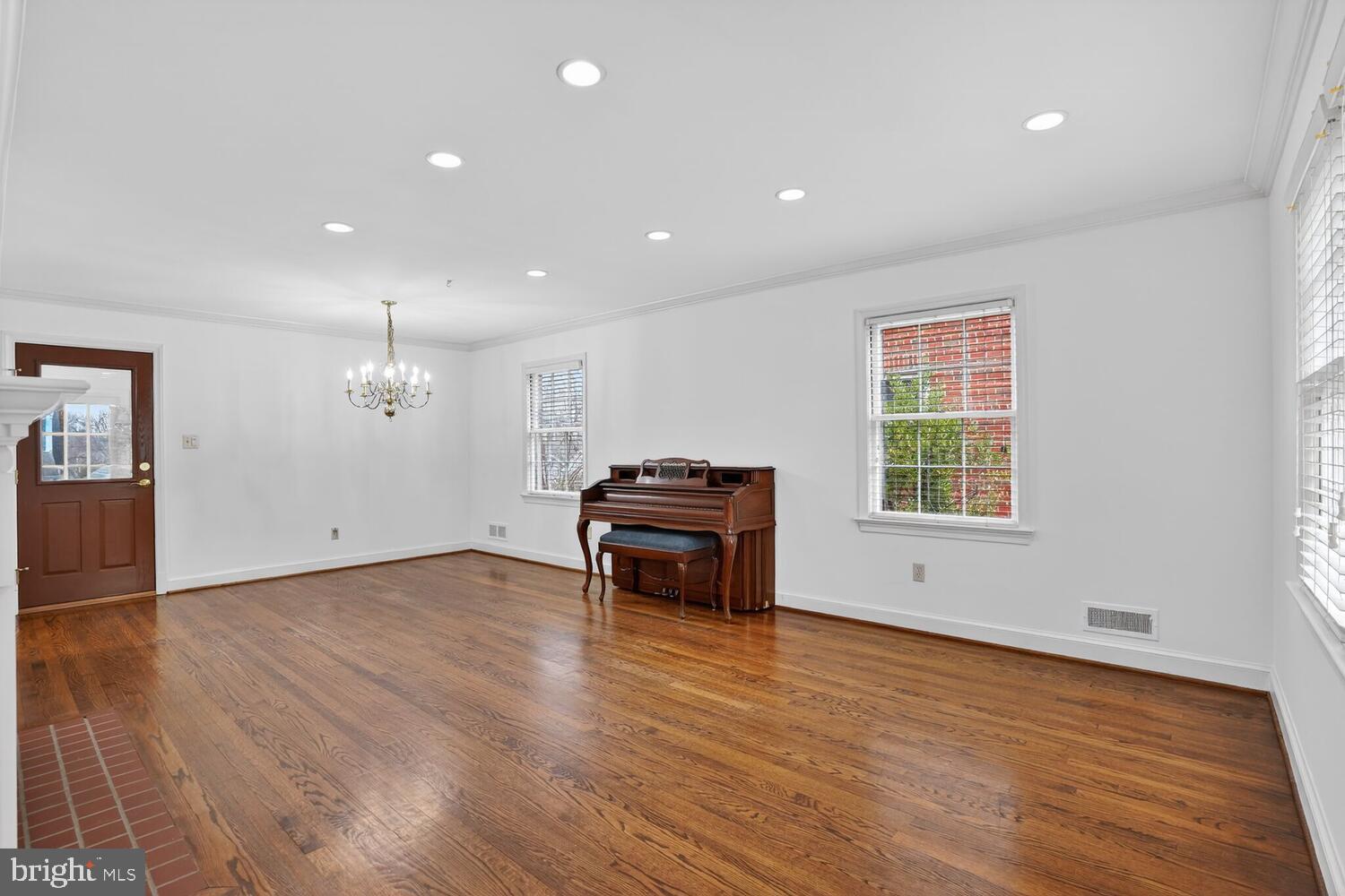 2420 Cameron Mills Road Alexandria, VA 22302 - Photo 9 of 45 a living room with hard wood floors and a wooden floors