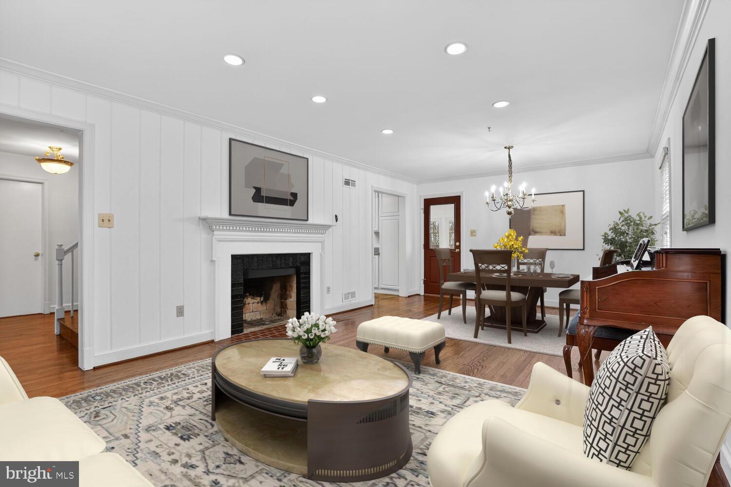 2420 Cameron Mills Road Alexandria, VA 22302 - Photo 10 of 45 a living room with furniture and a fireplace