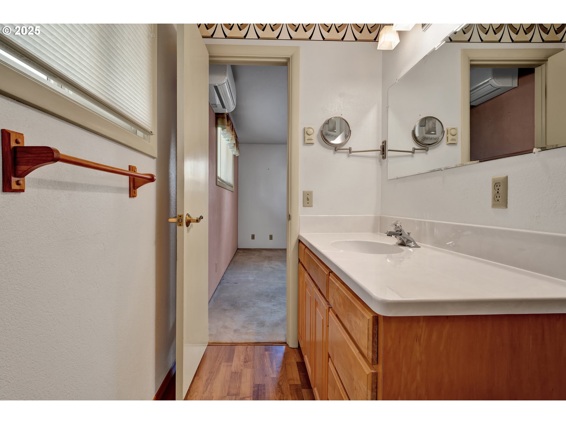 925 Ascot Drive Eugene, OR 97401 - Photo 22 of 44 a bathroom with a sink and a mirror