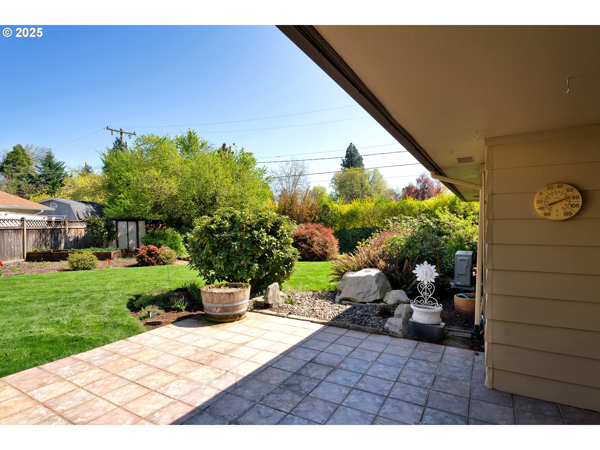 925 Ascot Drive Eugene, OR 97401 - Photo 37 of 44 a view of a porch with furniture and a garden