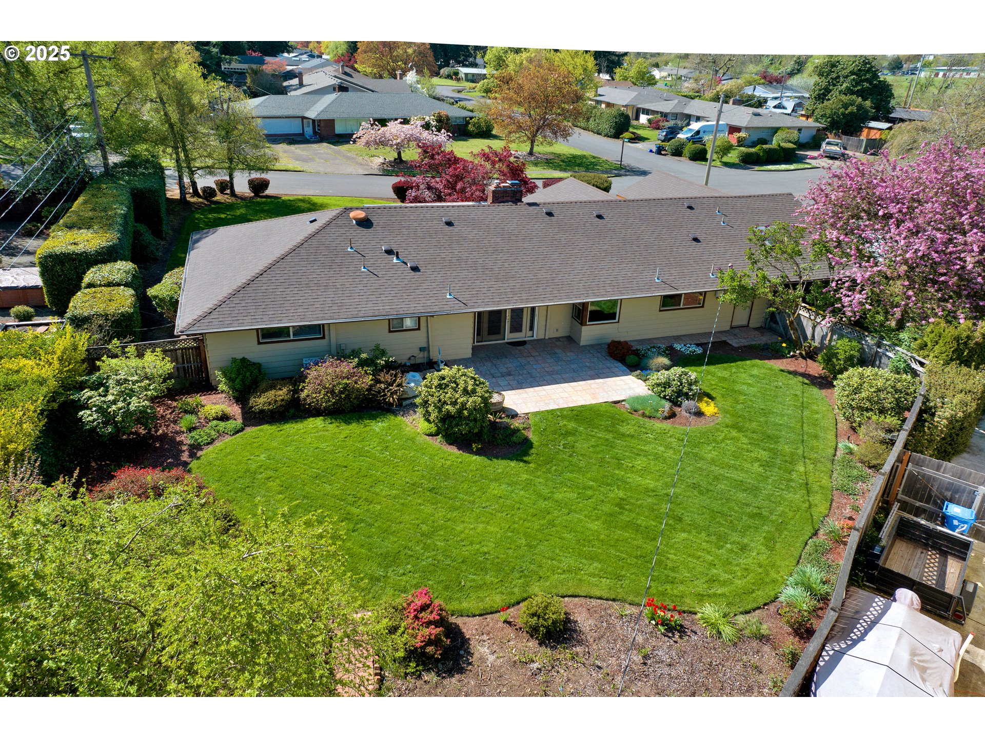 925 Ascot Drive Eugene, OR 97401 - Photo 43 of 44 a aerial view of a house with garden space and street view