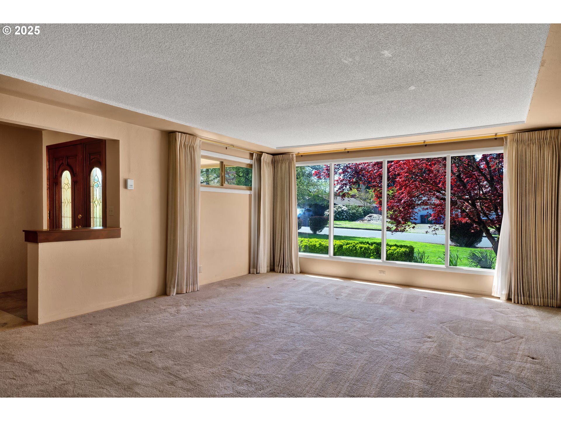 925 Ascot Drive Eugene, OR 97401 - Photo 6 of 44 a view of a house with a backyard and porch
