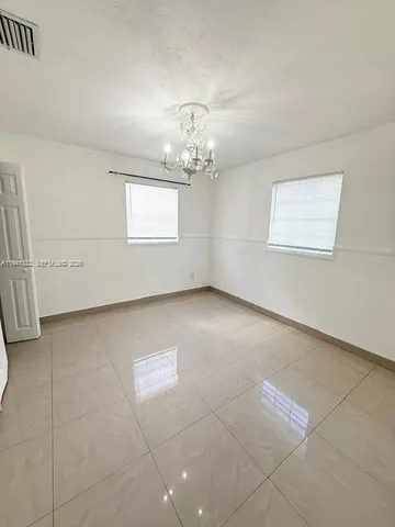 en empty room with windows