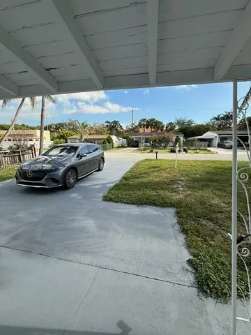 a view of car parked on the road