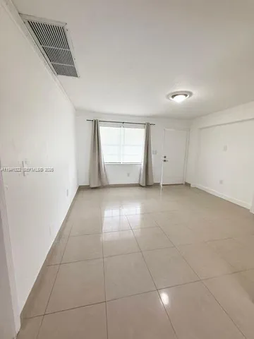 a view of empty room with window