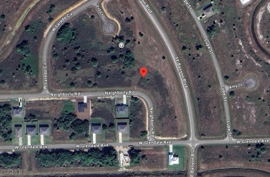 387 Neighborly Road LaBelle, FL 33935 - Photo 2 of 3 an aerial view of a large building