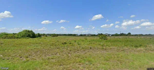 a view of a lake from a yard