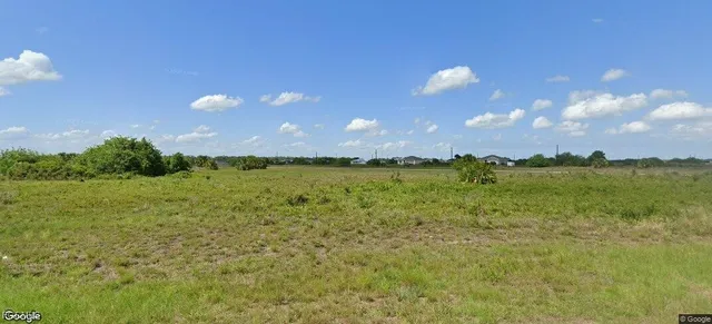 a view of a lake from a yard