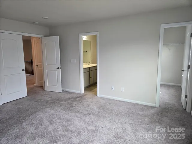 a bathroom with a sink toilet and vanity