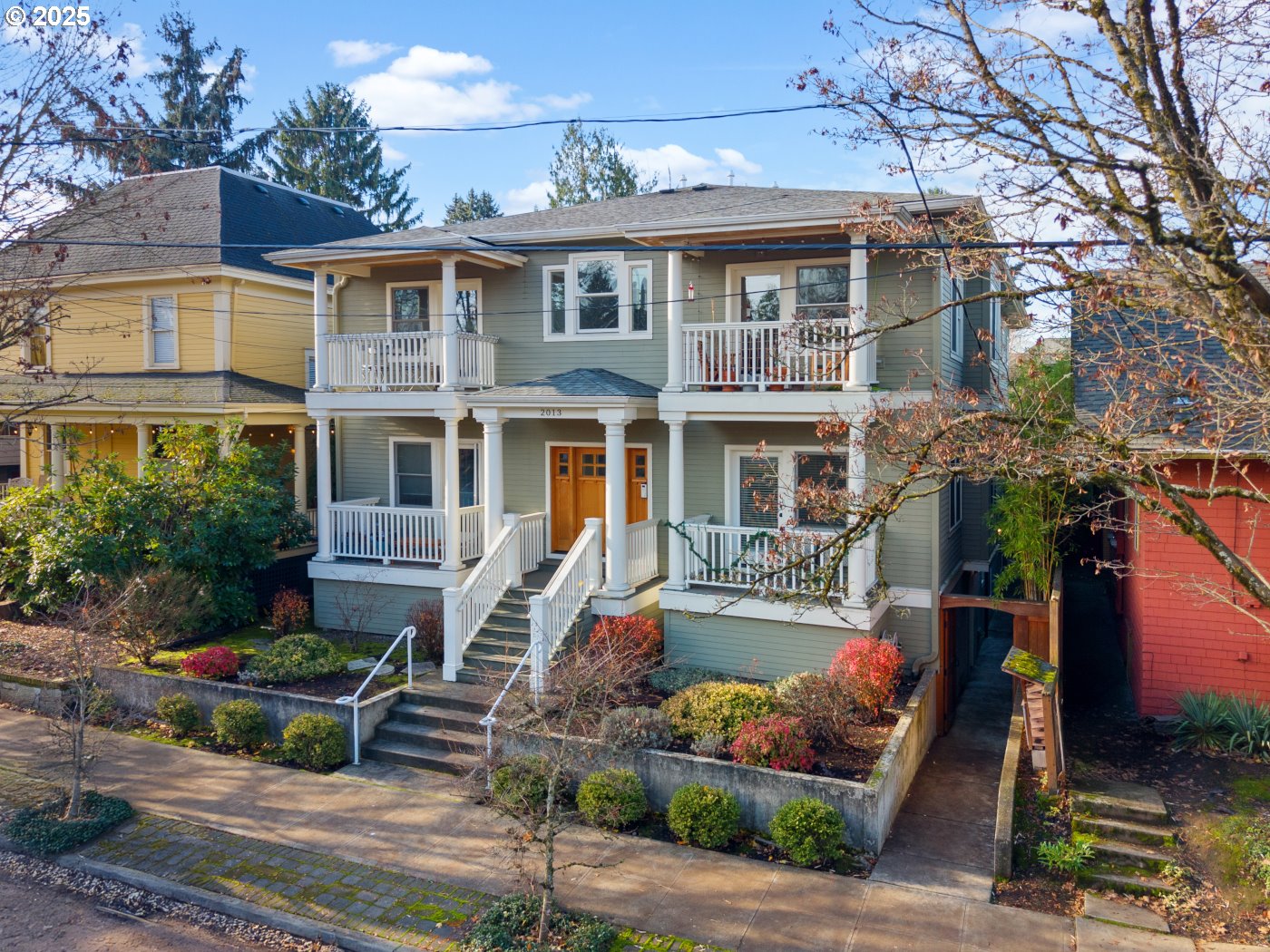 2013 Northeast 10th Avenue, Unit E Portland, OR 97212 - Photo 1 of 30 a front view of a house with entertaining space