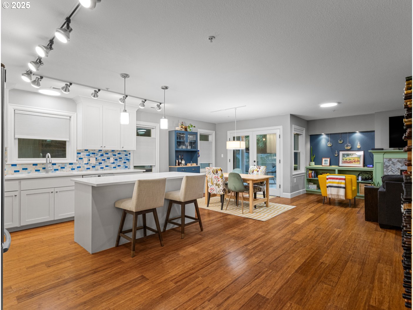 2013 Northeast 10th Avenue, Unit E Portland, OR 97212 - Photo 19 of 30 a living room with stainless steel appliances kitchen island granite countertop furniture and a kitchen view