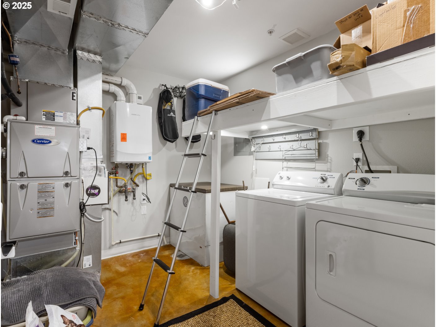 2013 Northeast 10th Avenue, Unit E Portland, OR 97212 - Photo 28 of 30 a bathroom with a sink mirror and shower