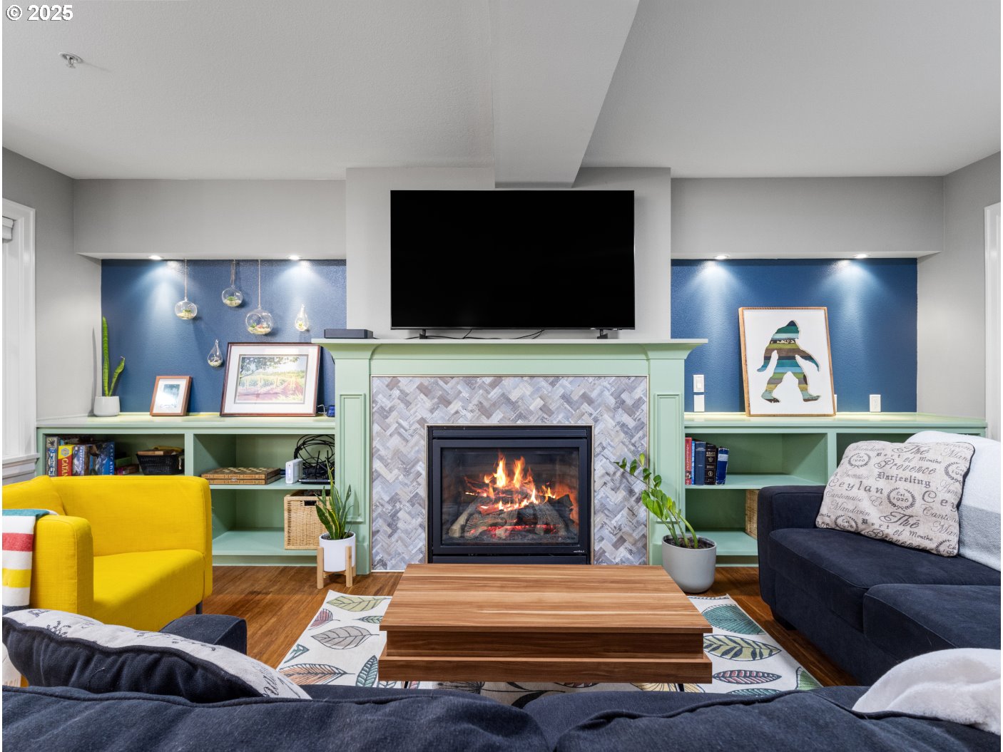 2013 Northeast 10th Avenue, Unit E Portland, OR 97212 - Photo 8 of 30 a living room with furniture and a fireplace