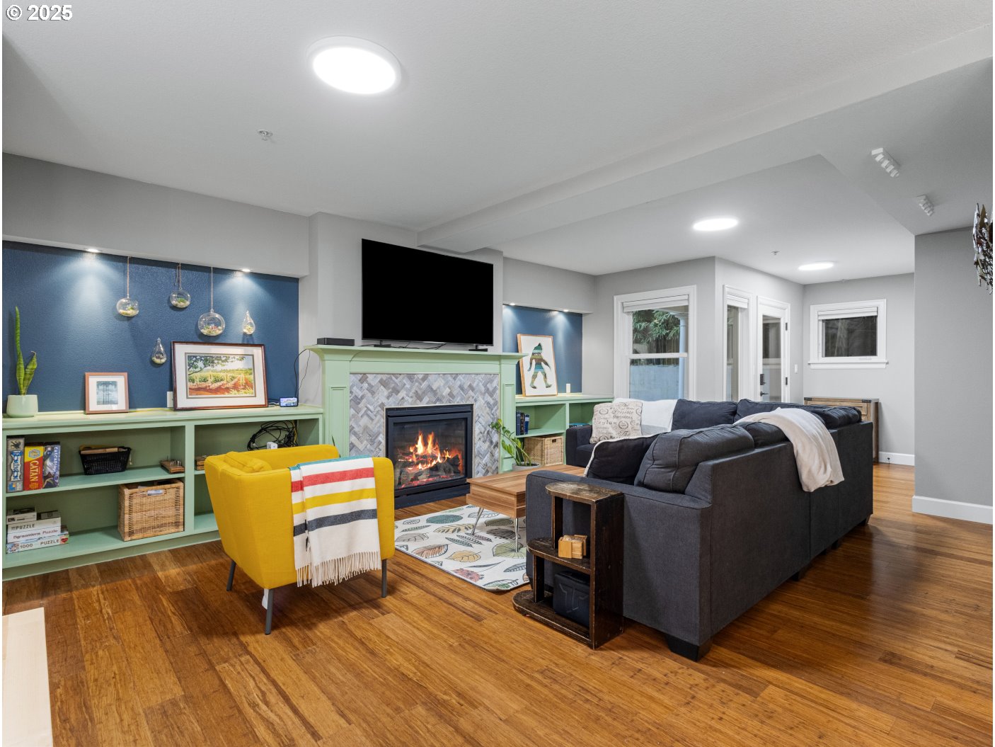 2013 Northeast 10th Avenue, Unit E Portland, OR 97212 - Photo 9 of 30 a living room with furniture and a fireplace