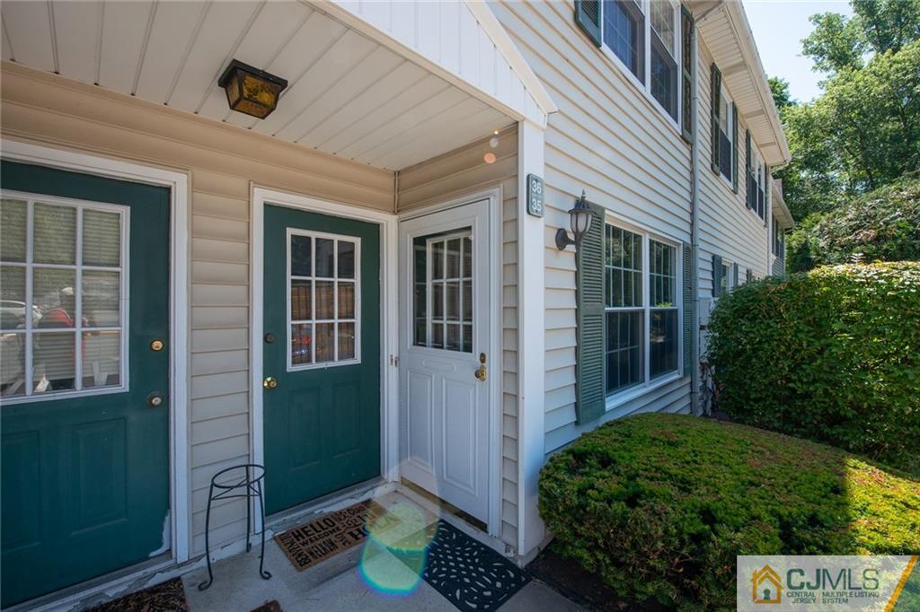 36 Hanover Square, Unit E Middlesex, NJ 08846 - Photo 1 of 23 a backyard of a house with lots of green space