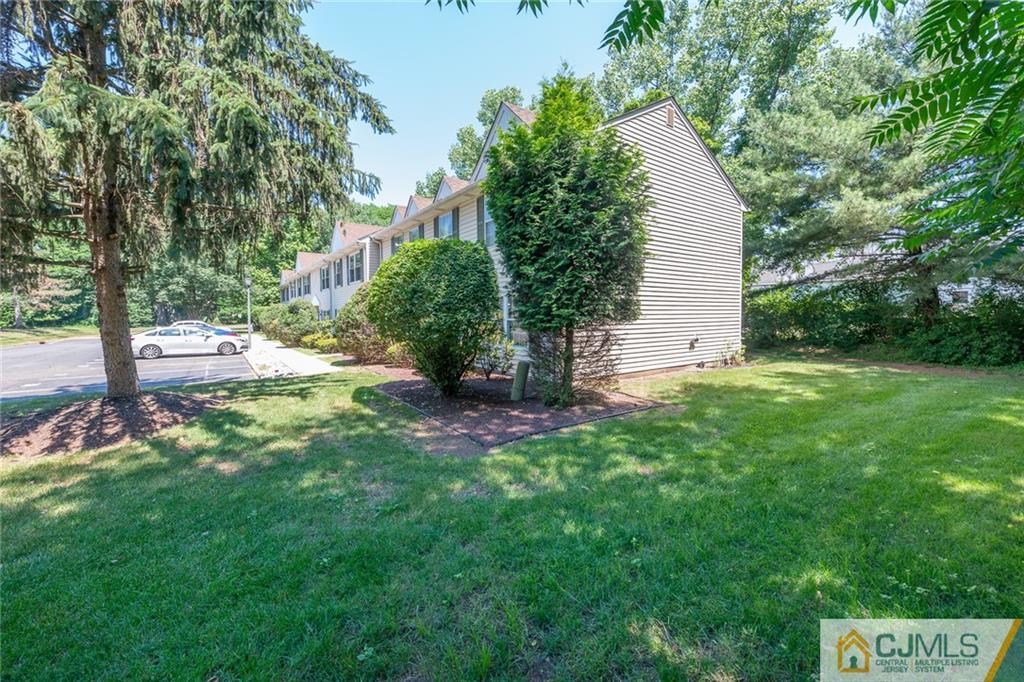 36 Hanover Square, Unit E Middlesex, NJ 08846 - Photo 23 of 23 a view of a house with a backyard