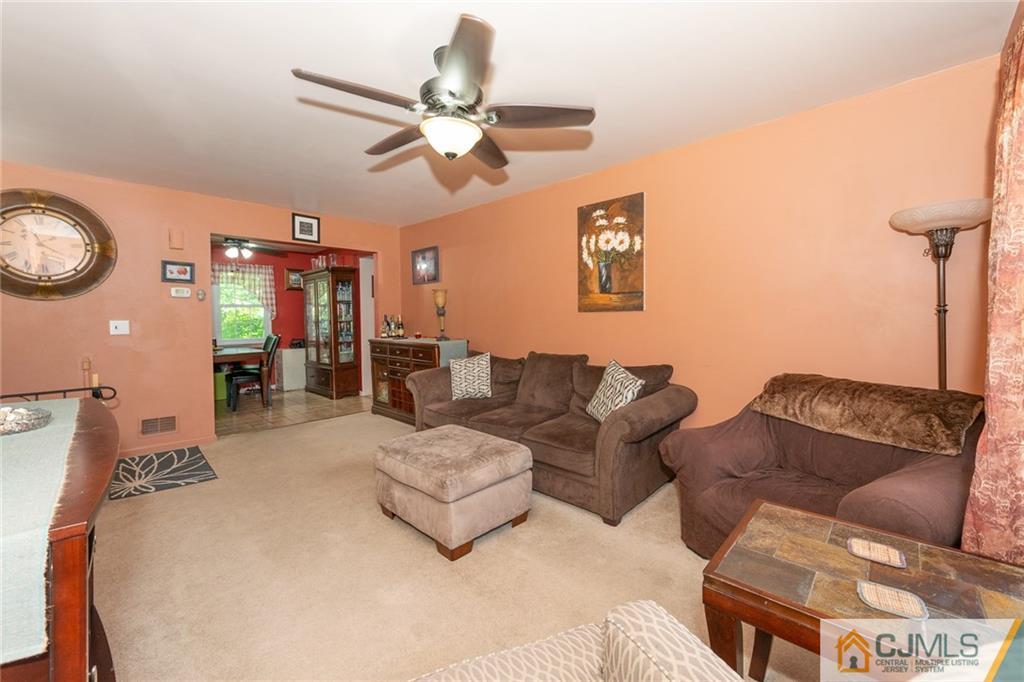 36 Hanover Square, Unit E Middlesex, NJ 08846 - Photo 6 of 23 a living room with furniture