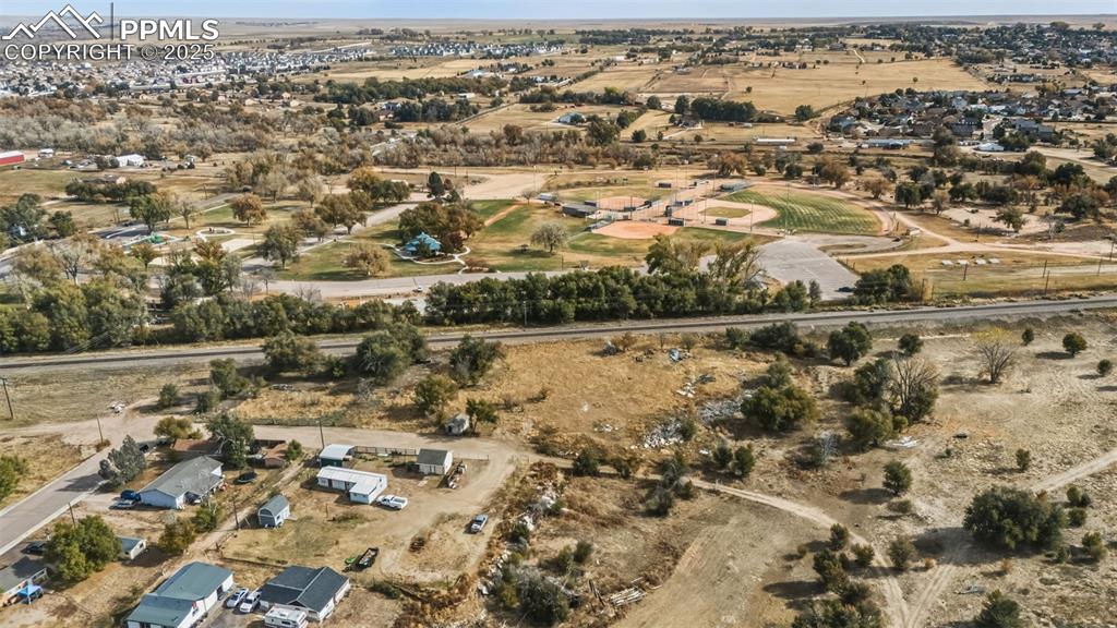 212 South Reed Street Fountain, CO 80817 - Photo 8 of 13 an aerial view of residential houses with outdoor space