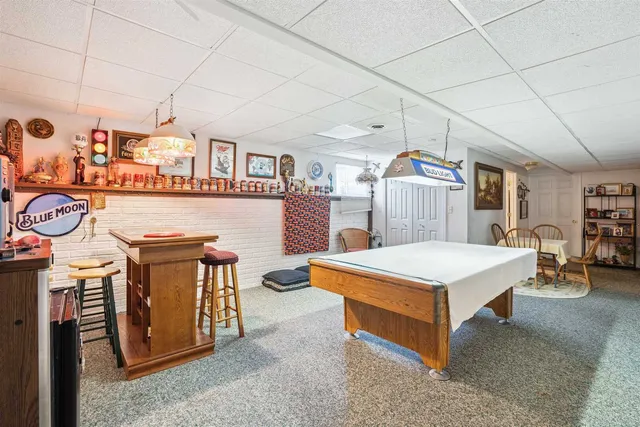 a room with furniture and a flat screen tv