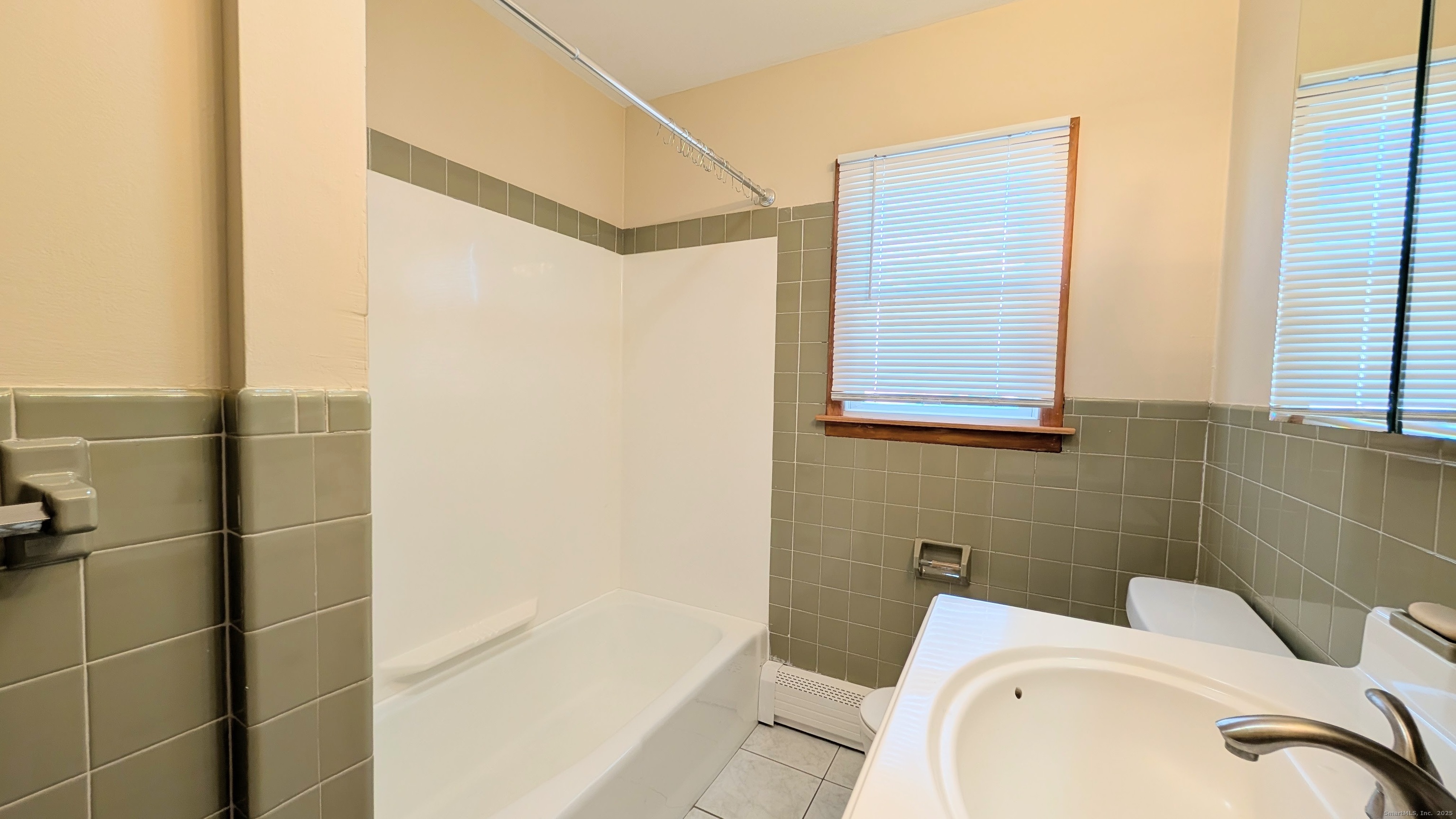 24 Hoyt Street, Unit 2 Danbury, CT 06810 - Photo 14 of 20 a bathroom with a toilet and a shower