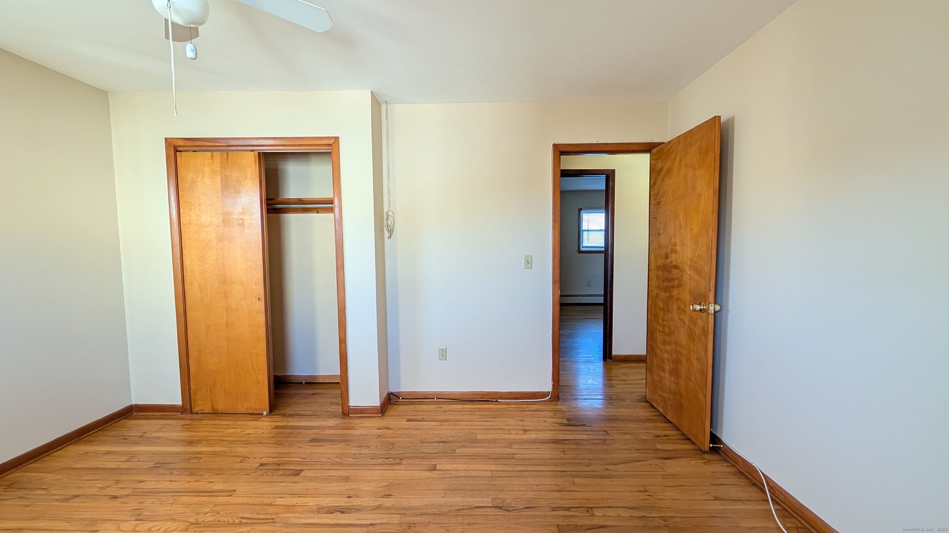 24 Hoyt Street, Unit 2 Danbury, CT 06810 - Photo 16 of 20 a view of an empty room with closet and a window