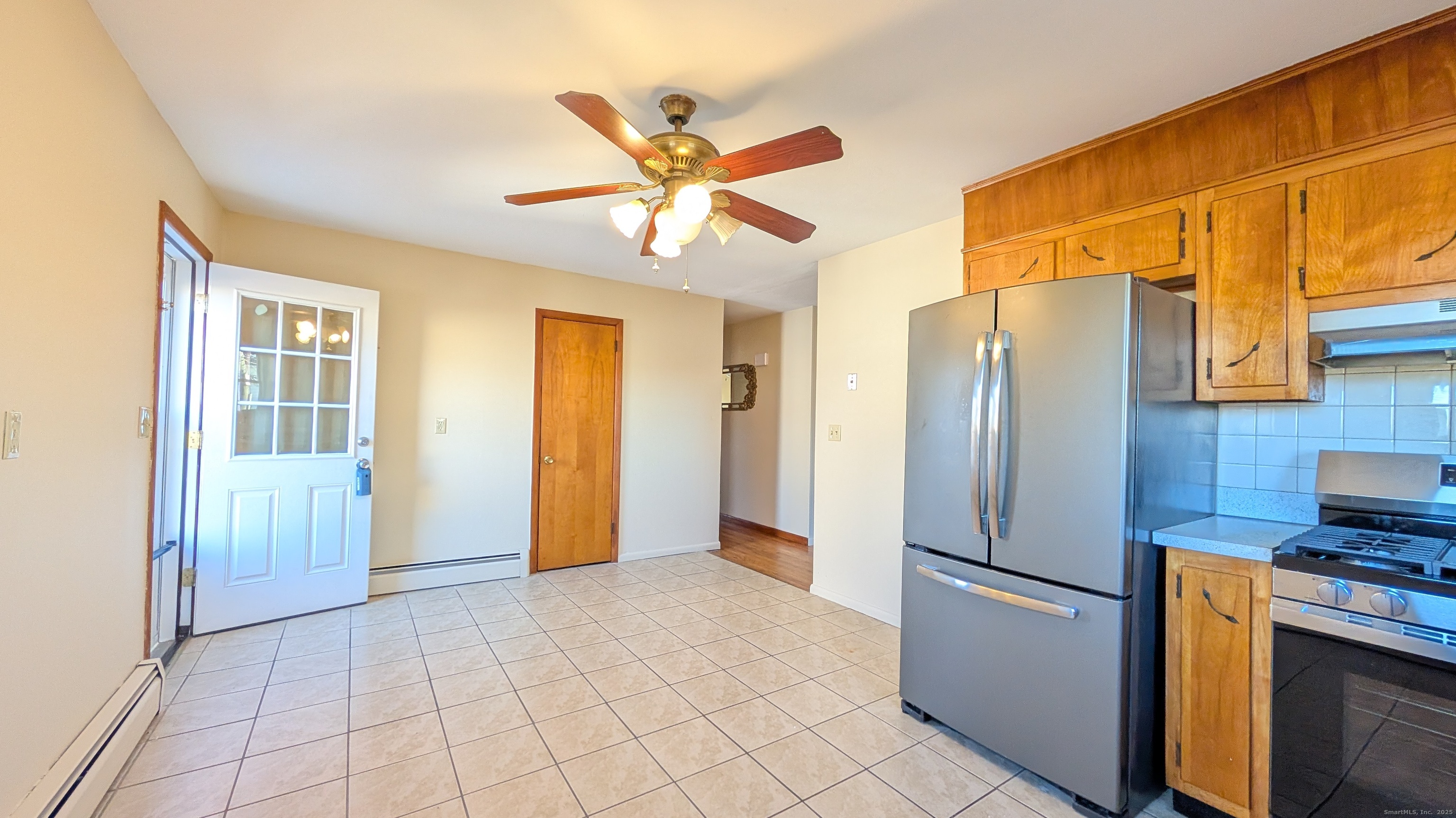 24 Hoyt Street, Unit 2 Danbury, CT 06810 - Photo 8 of 20 a kitchen with stainless steel appliances granite countertop a refrigerator and a sink