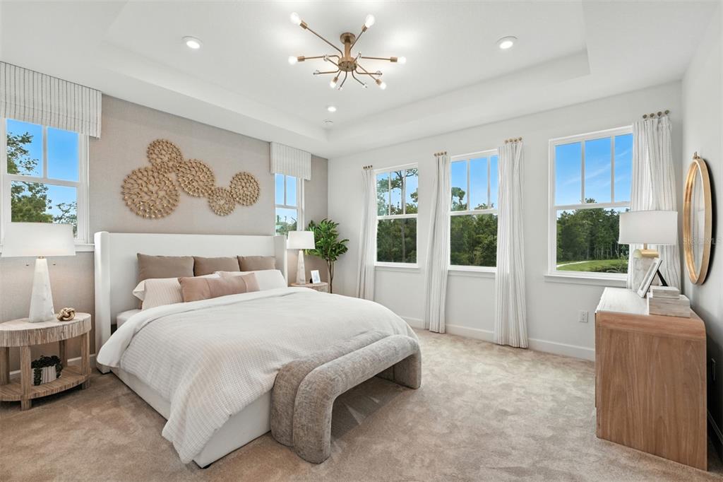 1752 Headland Loop Celebration, FL 34747 - Photo 15 of 31 a bedroom with a bed and a couch