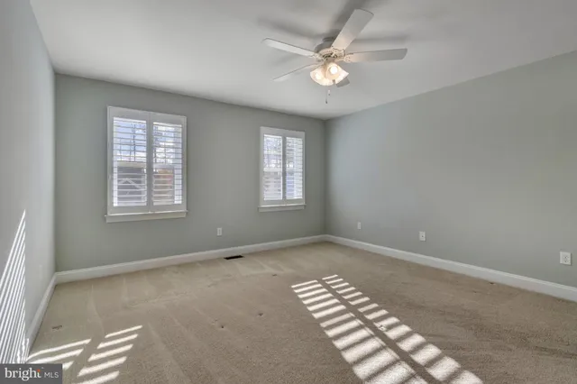 a view of a town with houses in the background