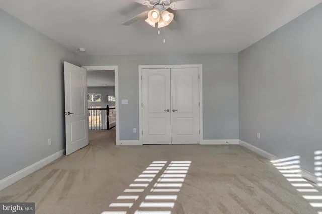 an aerial view of lake residential house with outdoor space and seating