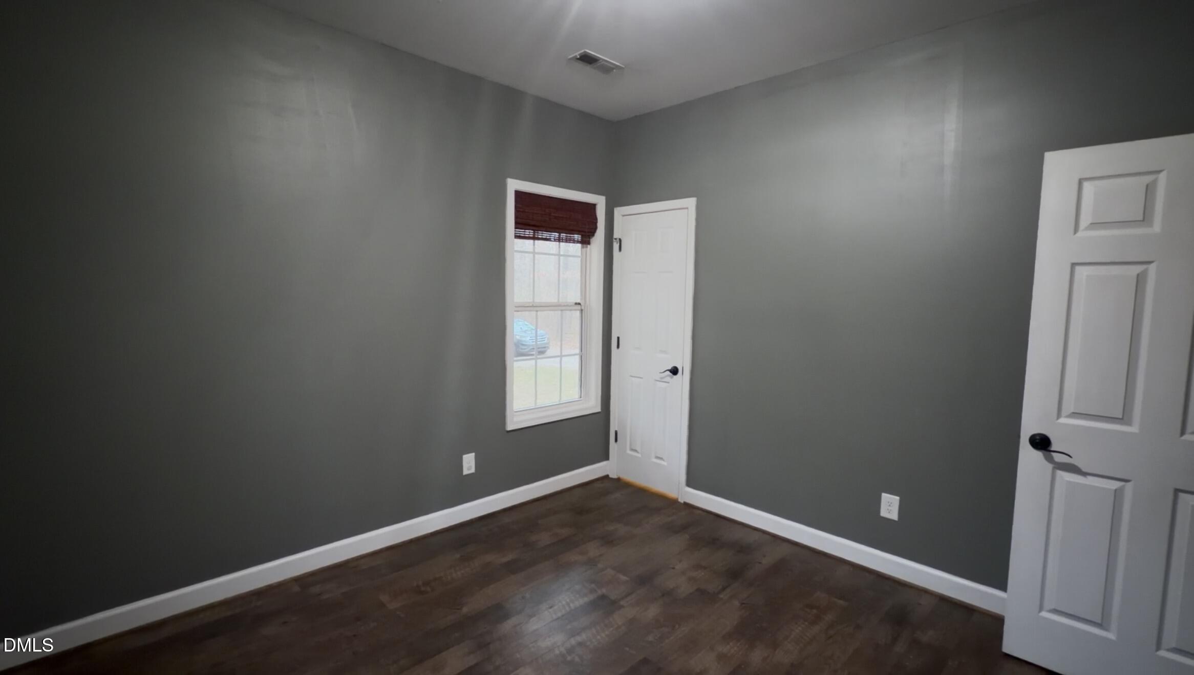 2733 Will Lucas Road Spring Lake, NC 28390 - Photo 12 of 21 an empty room with windows