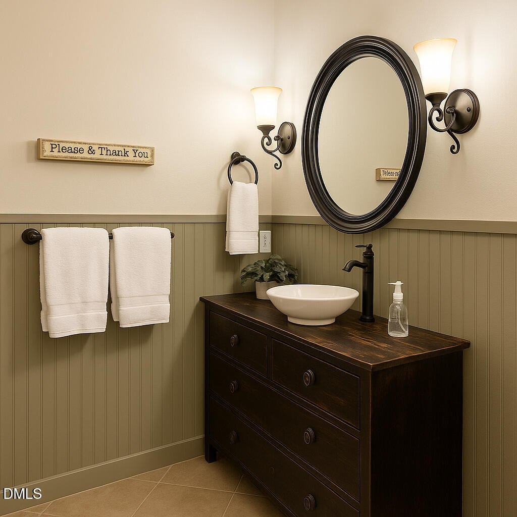 2733 Will Lucas Road Spring Lake, NC 28390 - Photo 14 of 25 a bathroom with a sink and a mirror