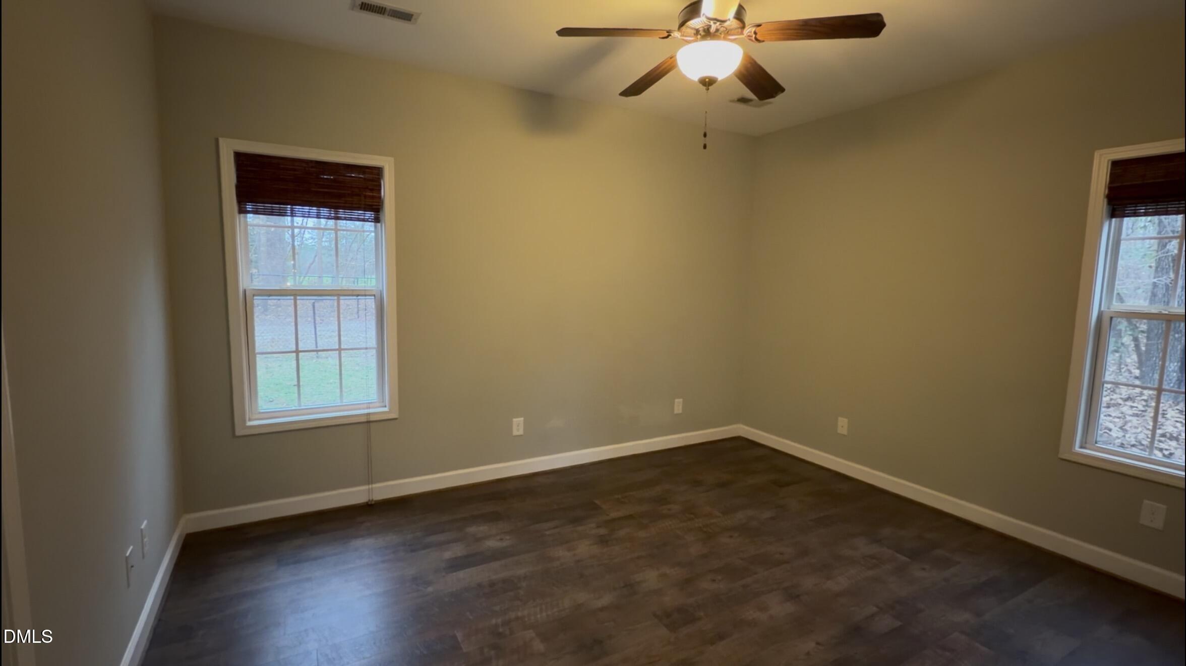 2733 Will Lucas Road Spring Lake, NC 28390 - Photo 14 of 21 an empty room with a window