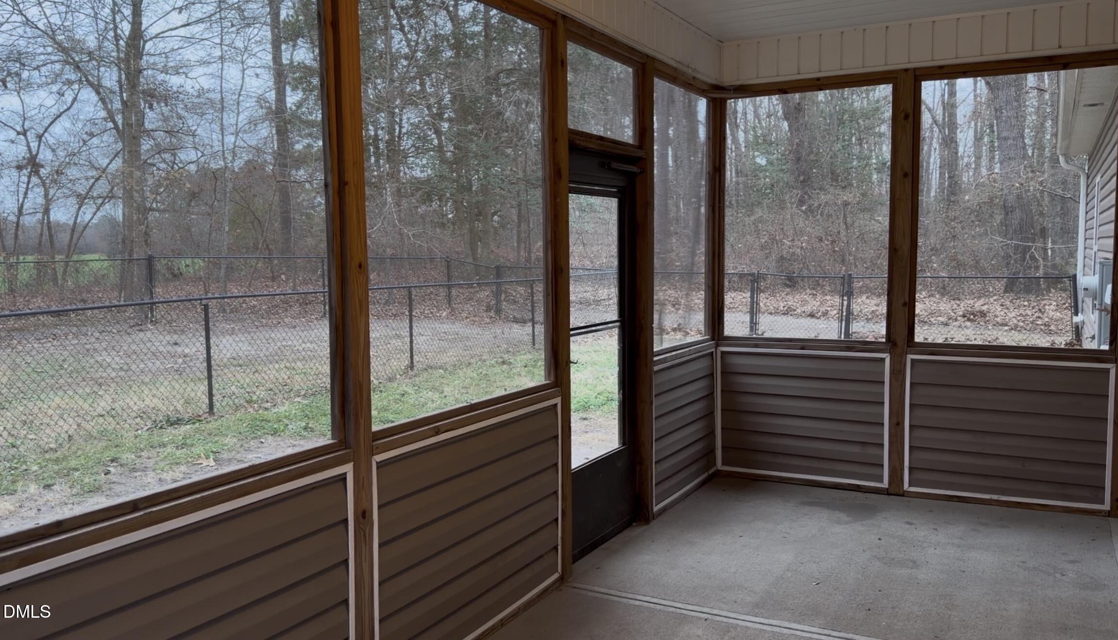 2733 Will Lucas Road Spring Lake, NC 28390 - Photo 16 of 21 a view of a glass door and a window