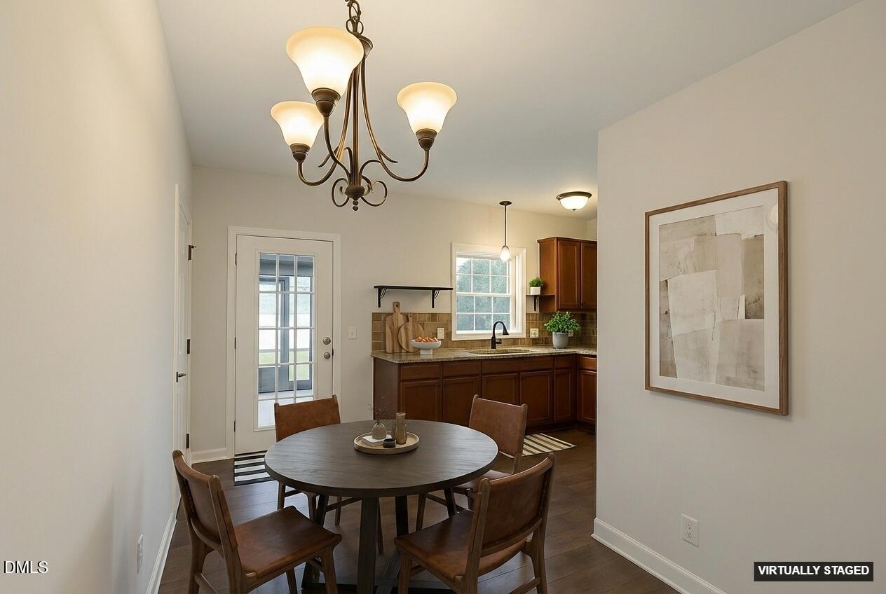 2733 Will Lucas Road Spring Lake, NC 28390 - Photo 6 of 25 a view of a dining room with furniture