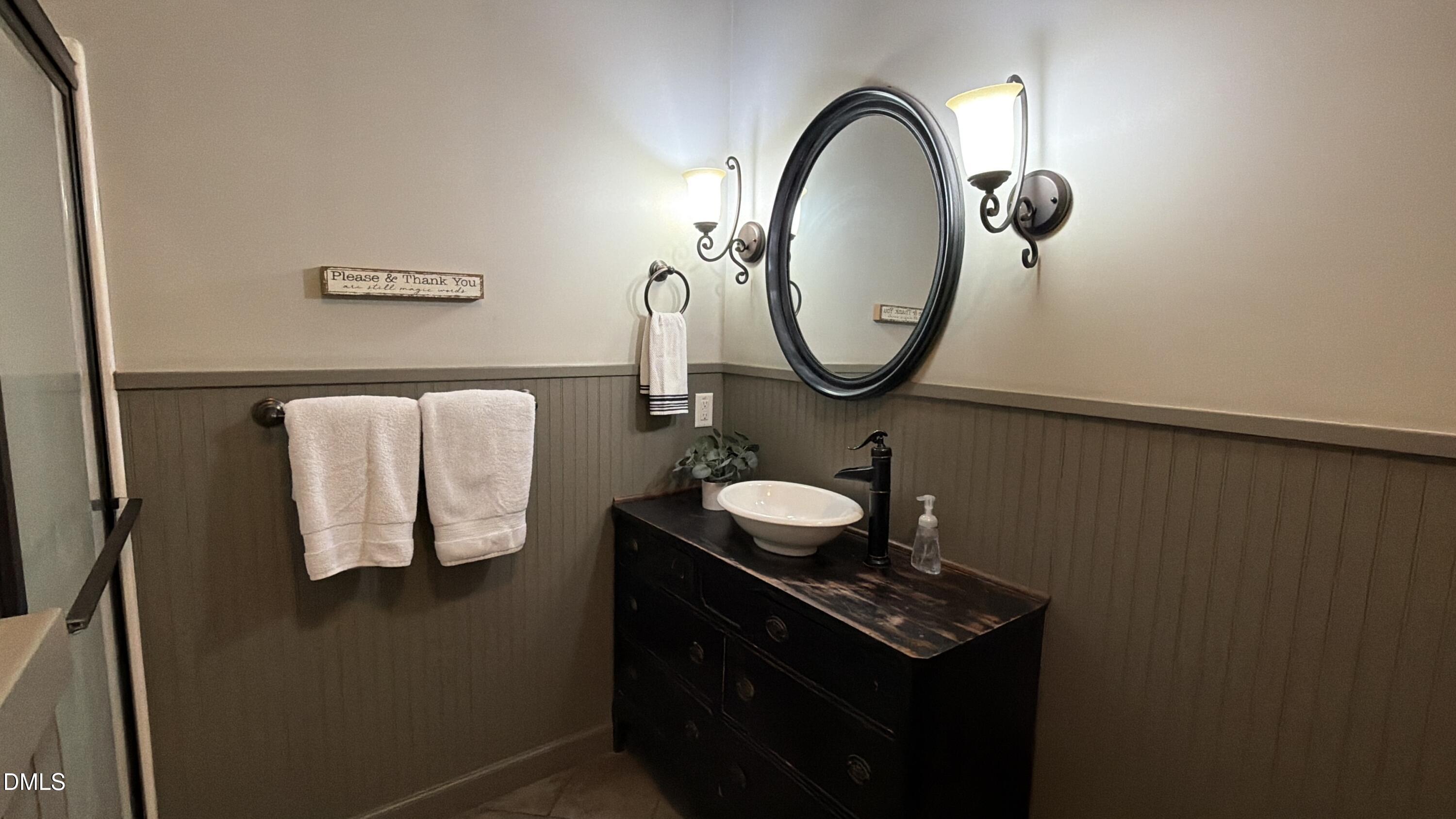 2733 Will Lucas Road Spring Lake, NC 28390 - Photo 10 of 21 a bathroom with a sink and a mirror